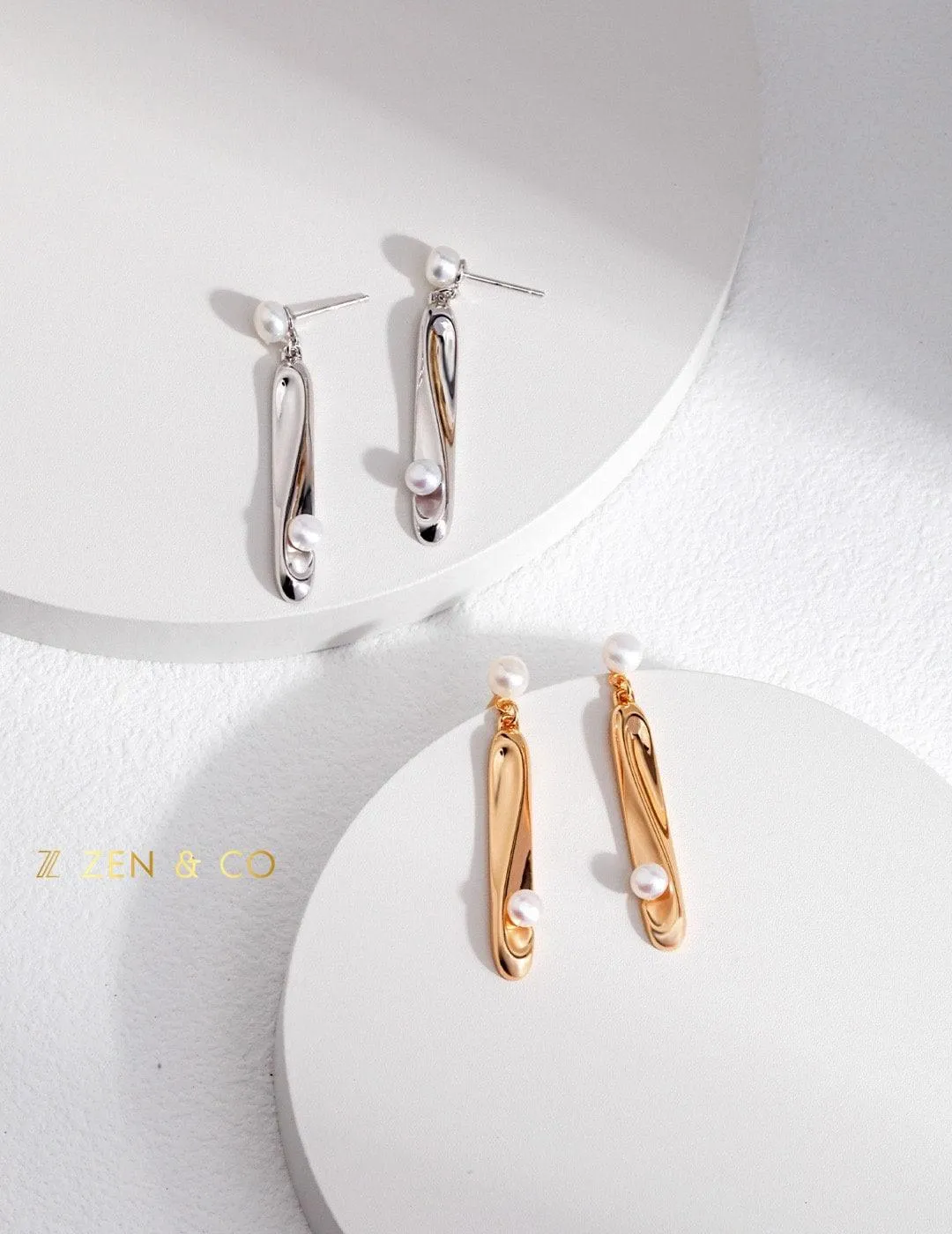 CLIO Long dangle earrings with dainty pearls