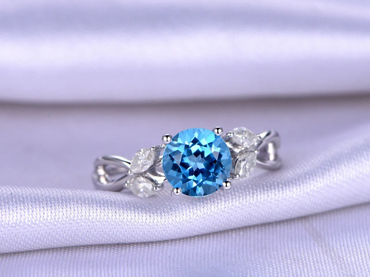 Unique 1.75 Carat Round Cut Blue Topaz Engagement Ring in White Gold