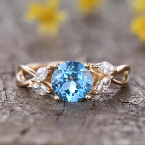 Unique 1.75 Carat Round Cut Blue Topaz Engagement Ring in White Gold