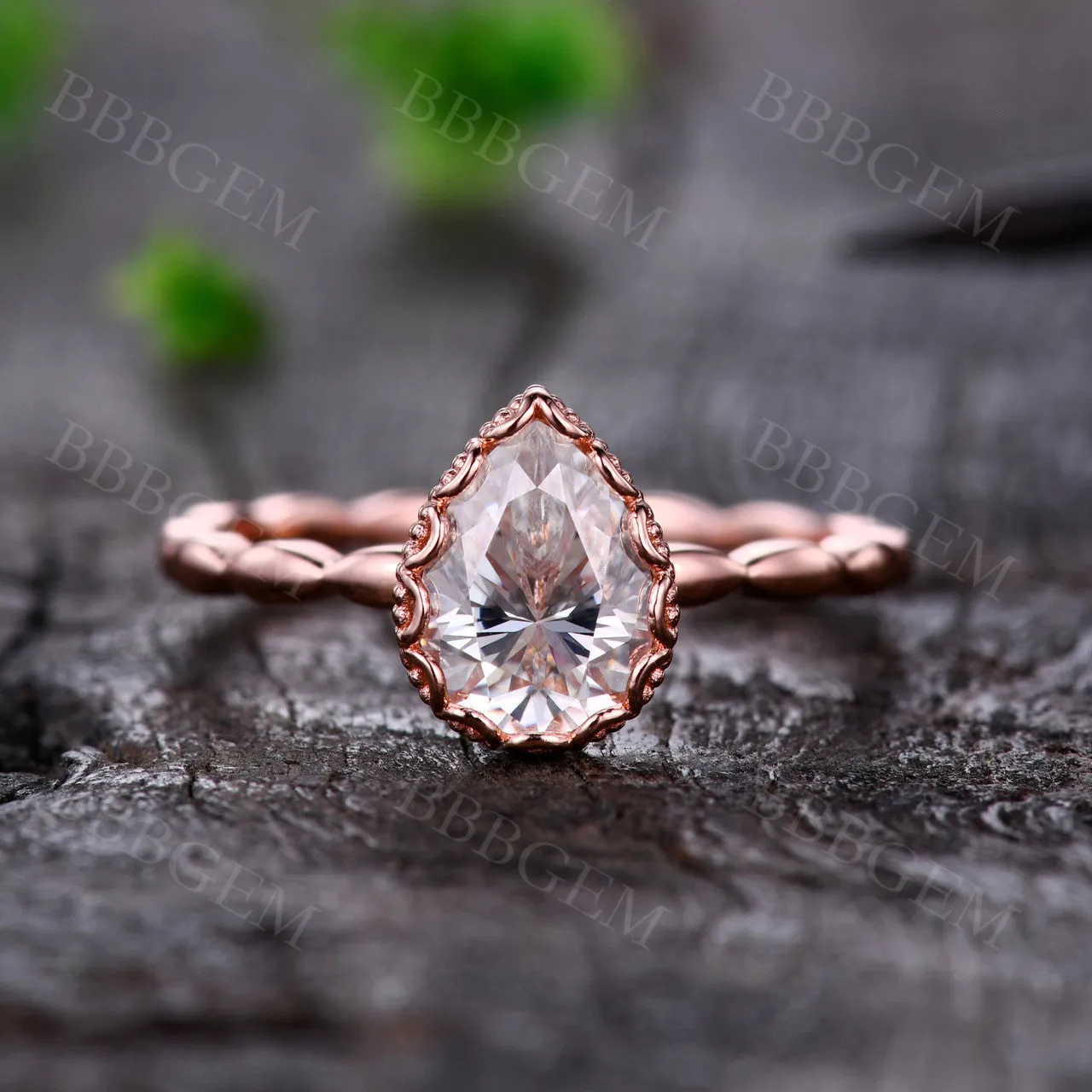 Unique Pear Cut 1.25 Carat Moissanite Engagement Ring Bezel Set Rose Gold