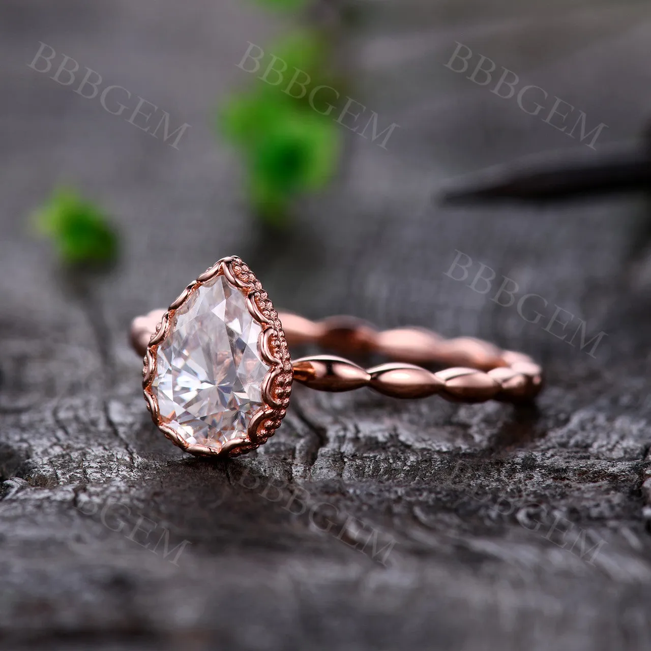 Unique Pear Cut 1.25 Carat Moissanite Engagement Ring Bezel Set Rose Gold