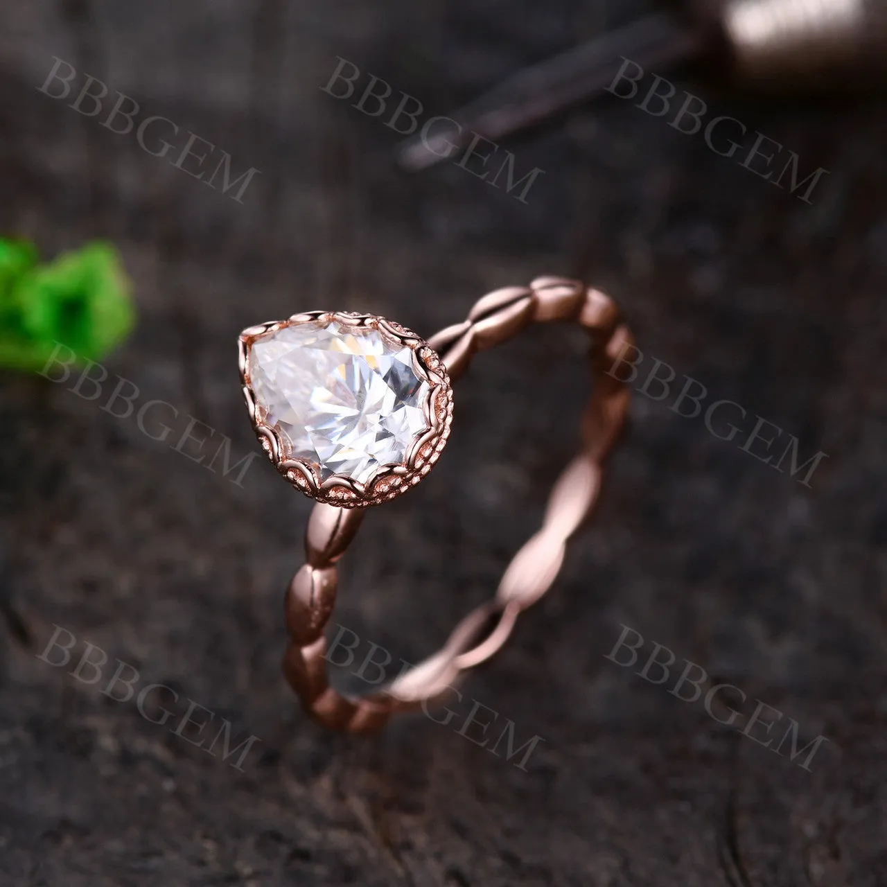 Unique Pear Cut 1.25 Carat Moissanite Engagement Ring Bezel Set Rose Gold